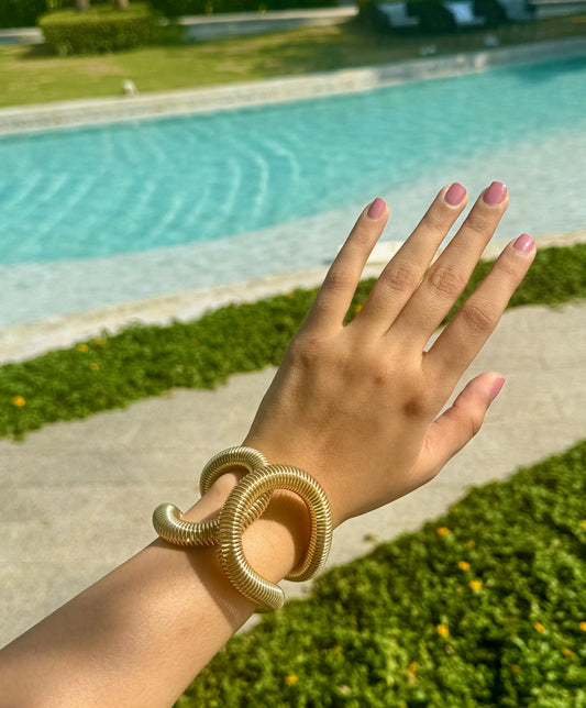 Statement gold spiral Bangle